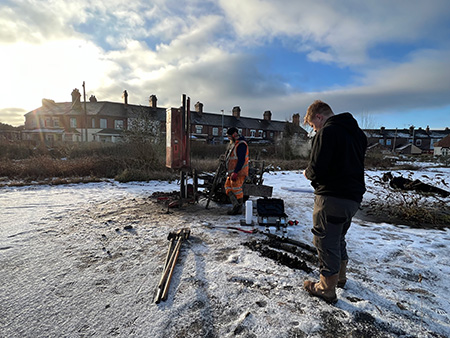 our team on site drilling for soil samples
